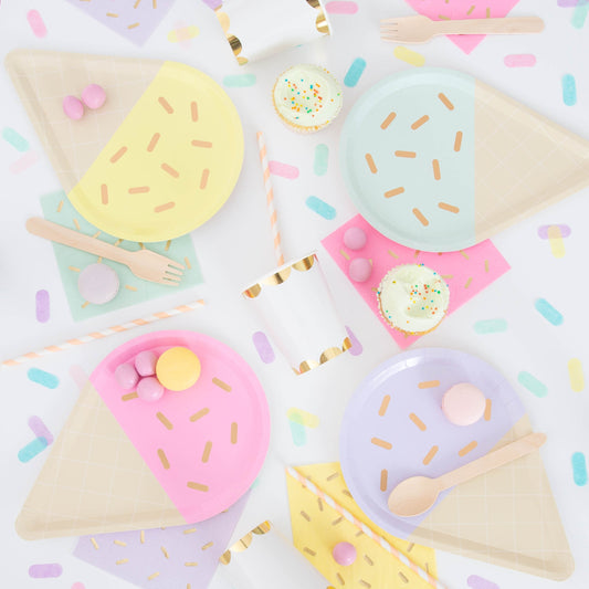 Ice cream party theme tableware set with pastel plates, cups, napkins, cupcakes, and confetti